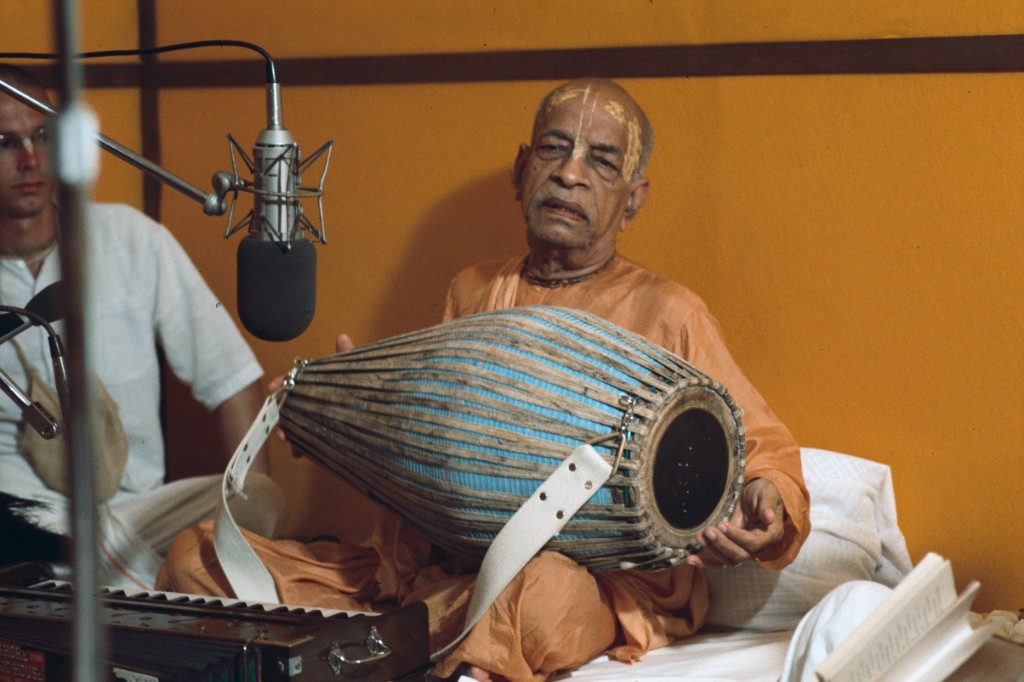 Srila Prabhupada playing mridanga